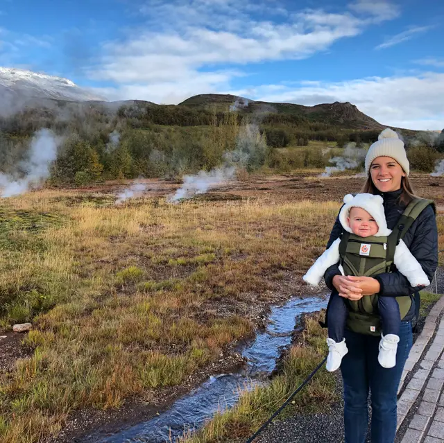 Carrying our baby on a geothermal boardwalk in Iceland